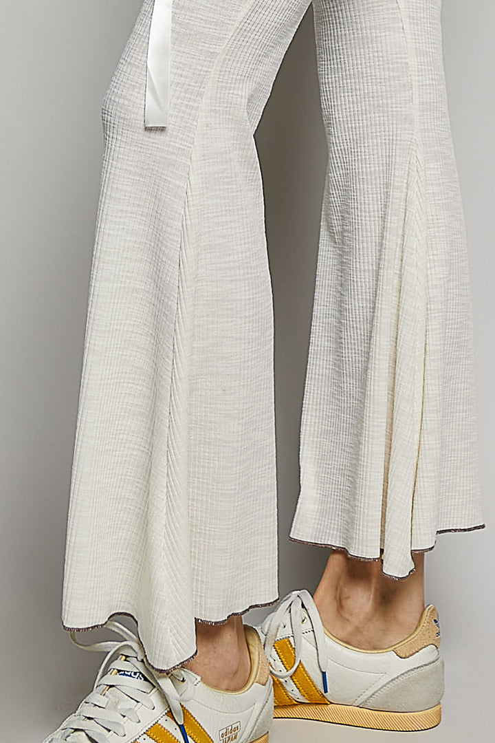 Ribbed knit flare pants with drawstring waist and patch pockets