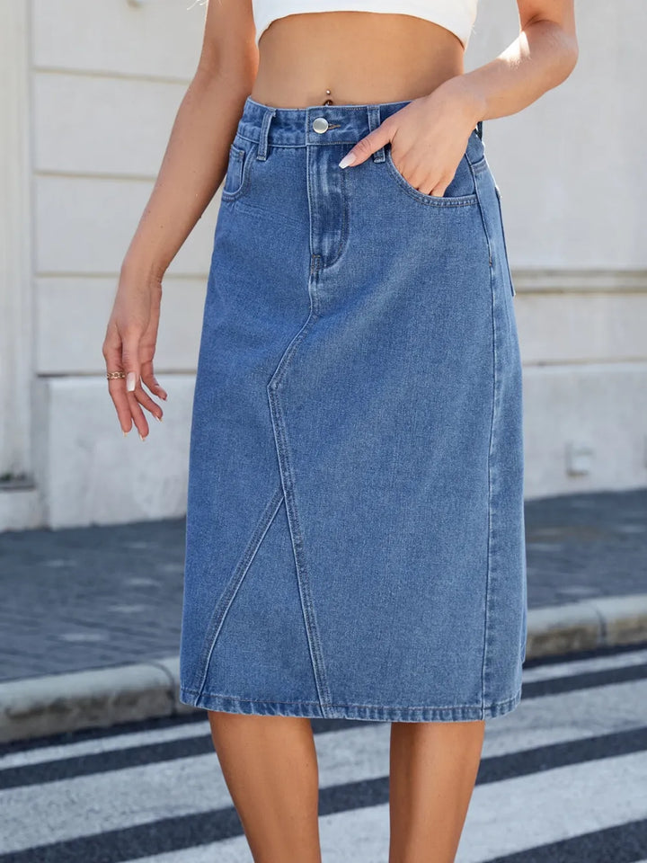 High-rise midi denim skirt with back slit and front pockets