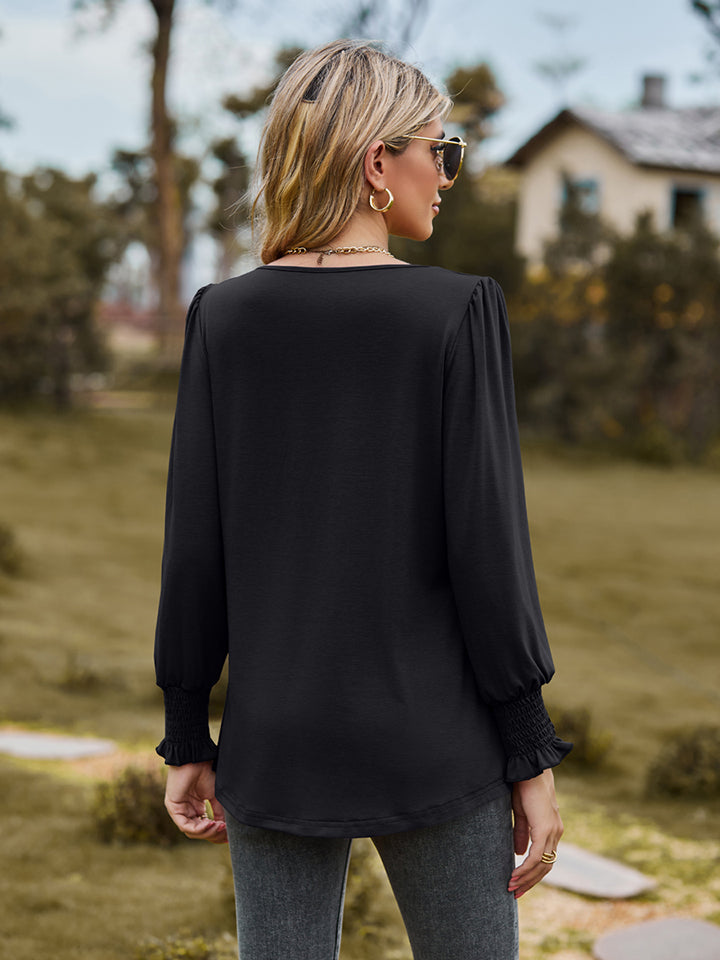 Pintuck pleated puff sleeve blouse with smocked cuffs