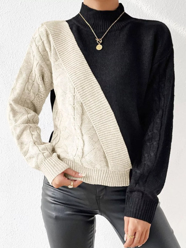 Diagonal color block cable knit mock neck sweater