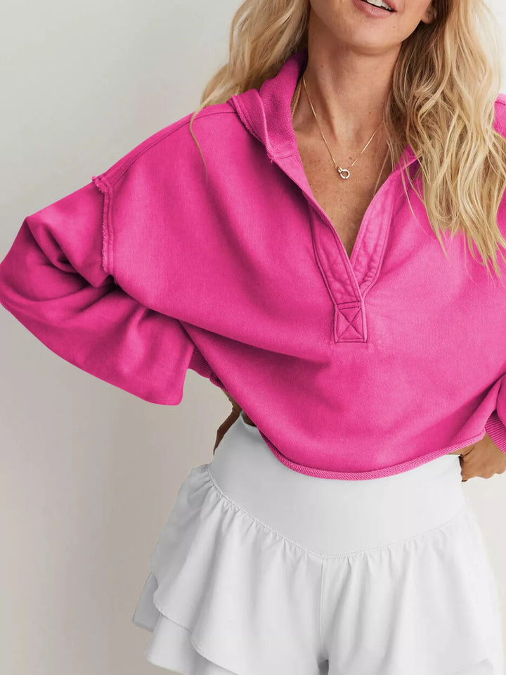 Cropped exposed-seam pullover hoodie with split neck
