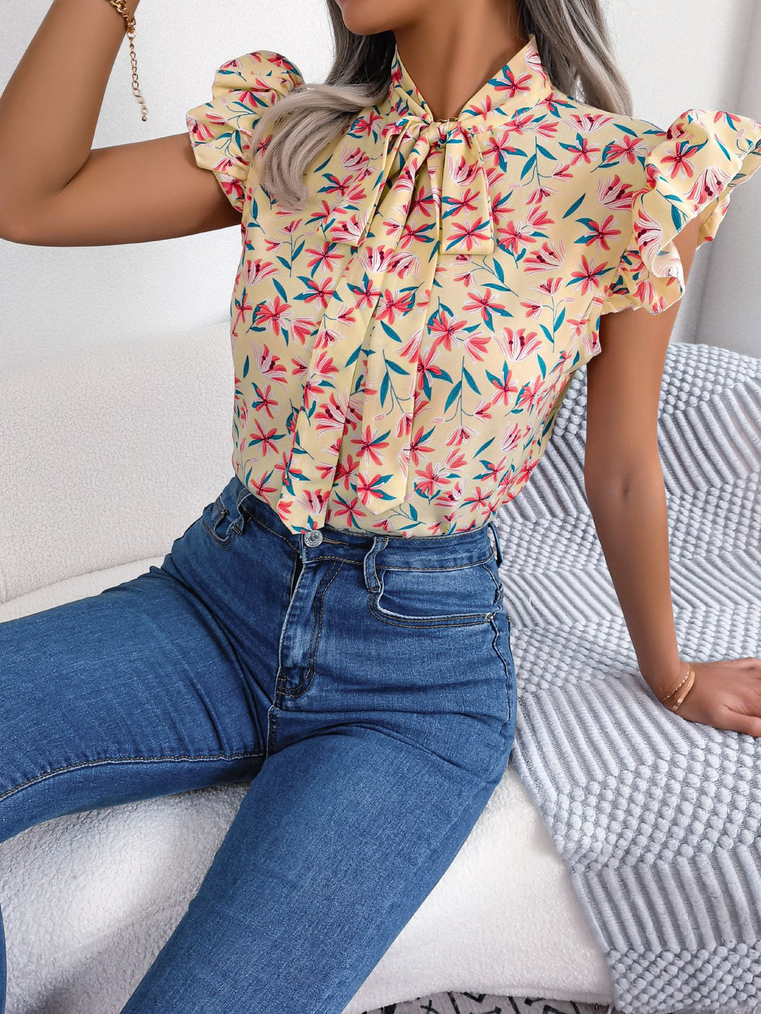 Apricot Floral tie-neck blouse with ruffled flutter sleeves