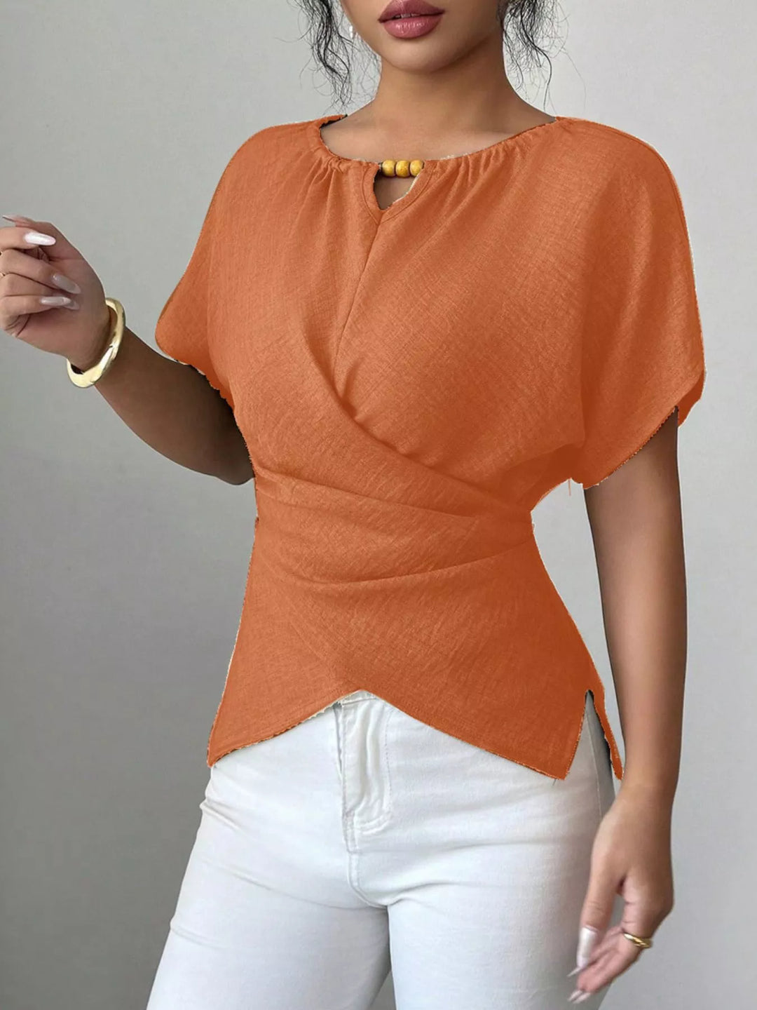 Orange Wrap-front short sleeve blouse with beaded keyhole neckline