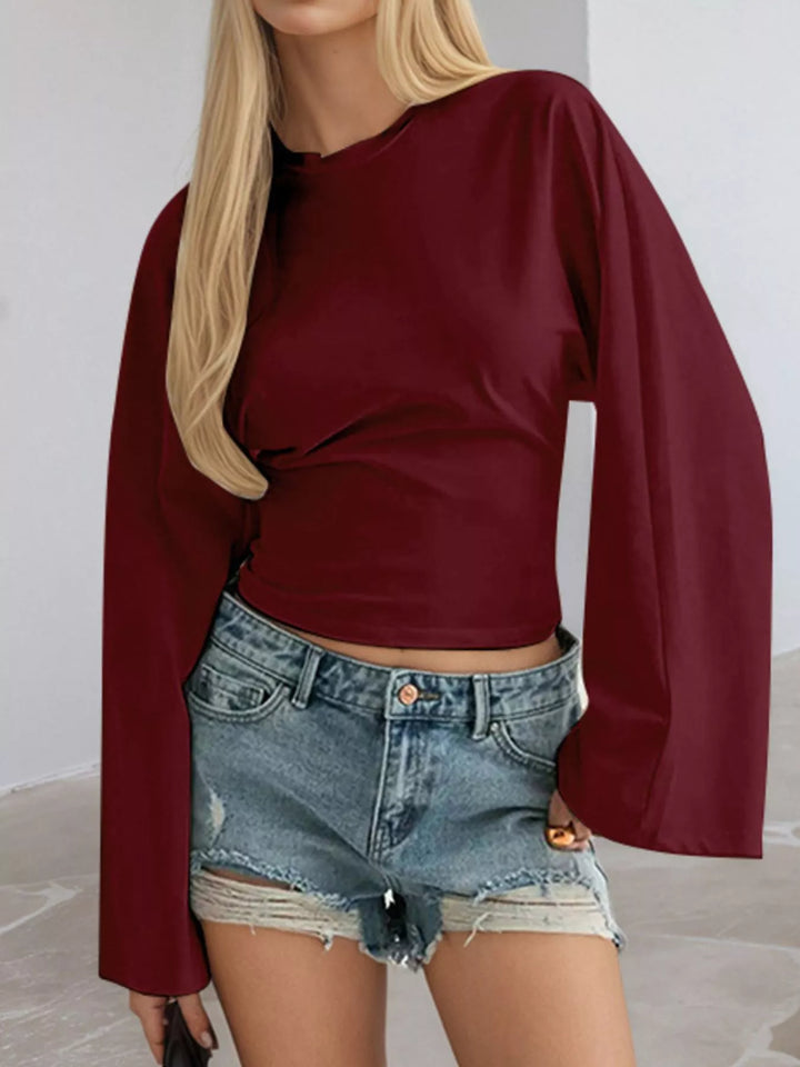 Fitted long sleeve top with flared bell sleeves