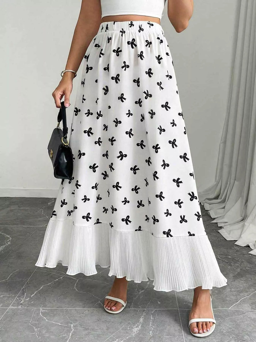 White Bow-print flowy maxi skirt with pleated ruffle hem