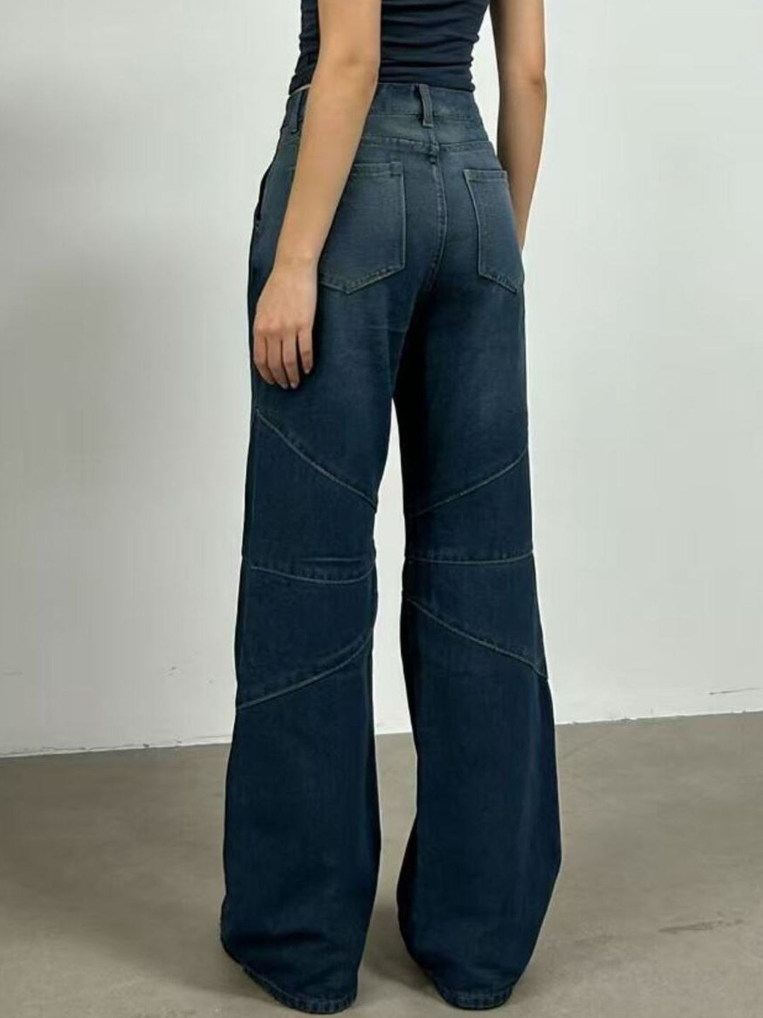 Vintage wash high-rise wide leg jeans with paneled seams