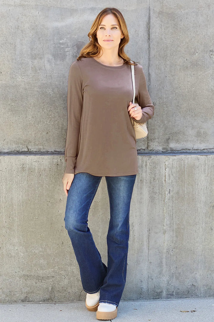 Crew neck long sleeve top with curved hem