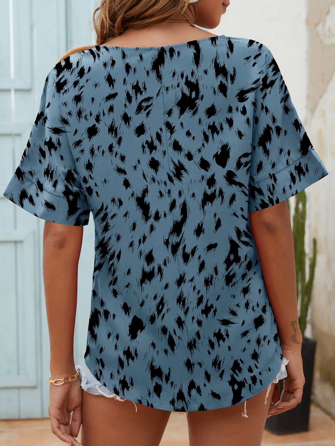 Animal print notched neck short sleeve blouse