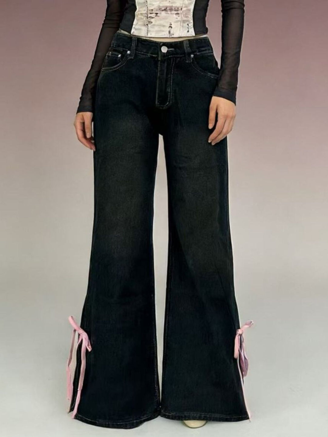 Low-rise flare jeans with ribbon bow leg slits