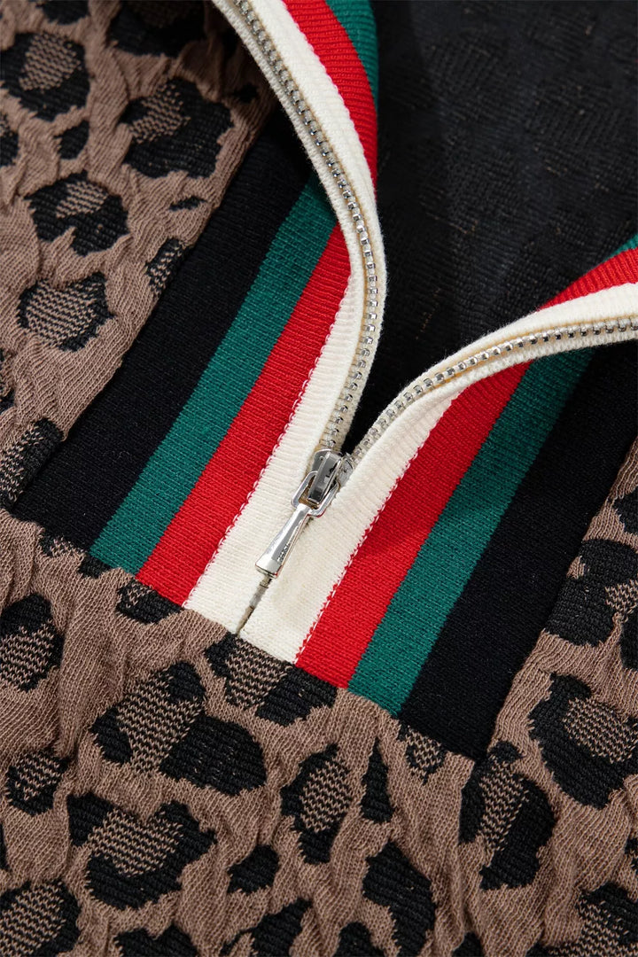 Leopard half-zip short sleeve top with striped collar and cuffs