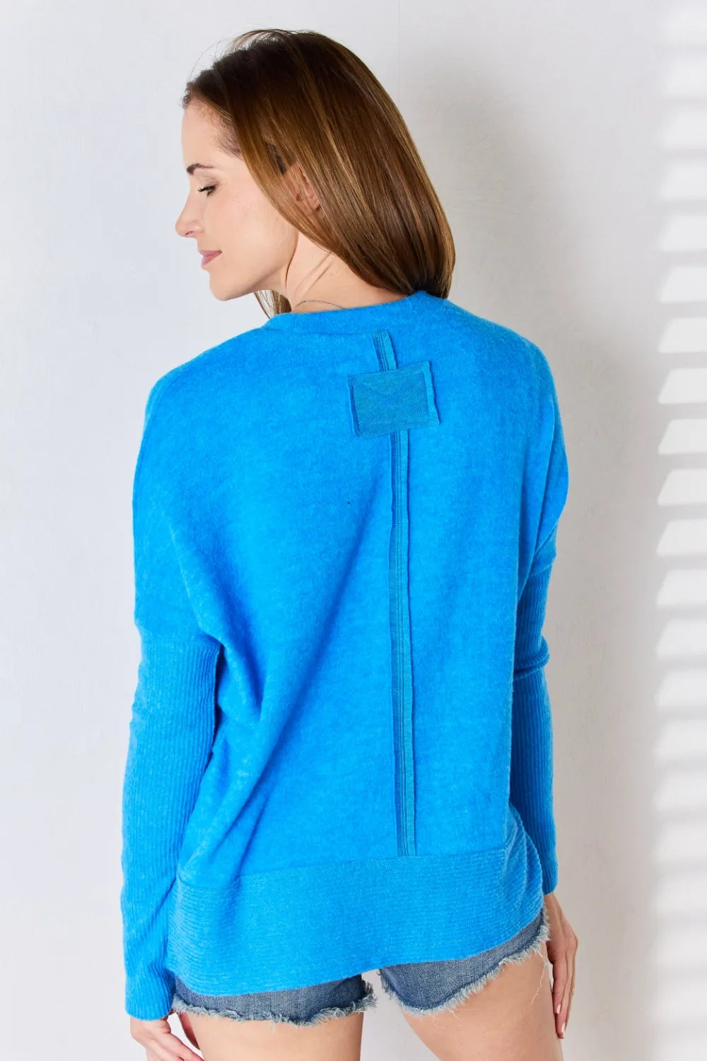 Ribbed trim round neck long sleeve knit top