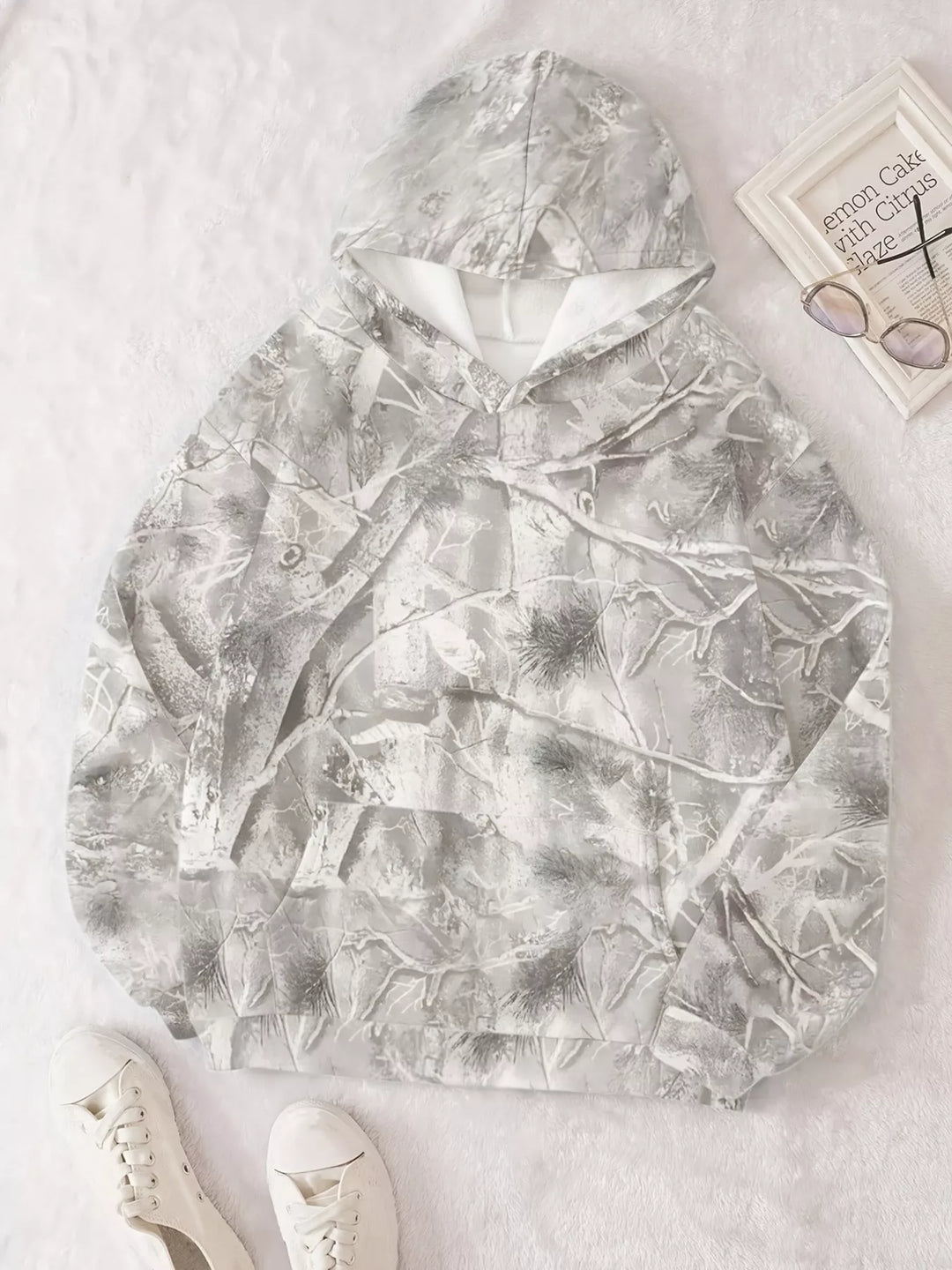 Oversized forest camo pullover hoodie with kangaroo pocket