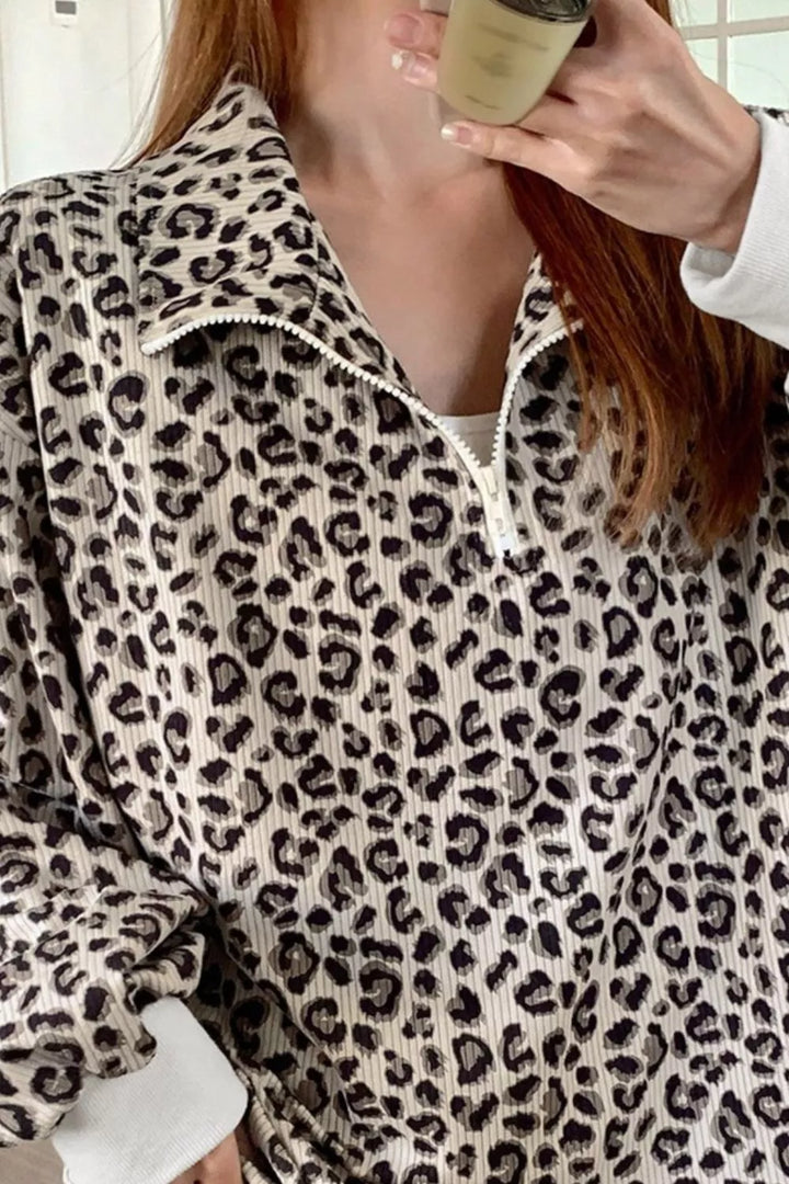 Leopard print ribbed quarter-zip pullover sweatshirt