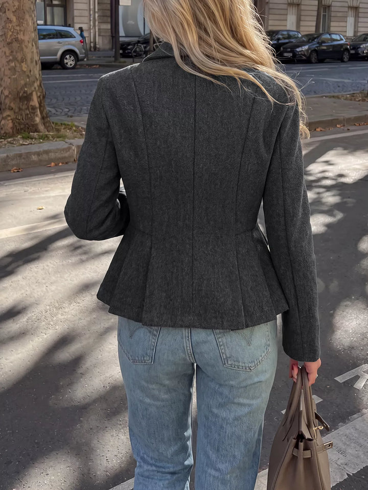 Double-breasted peplum blazer with notch lapel and flap pockets