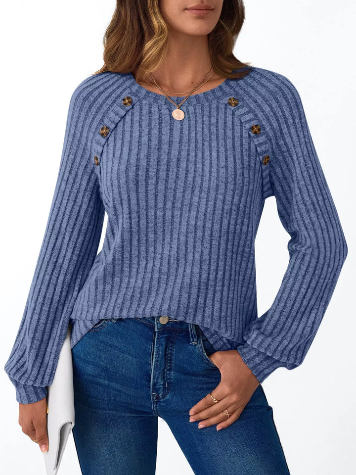 Ribbed knit long sleeve top with decorative shoulder buttons