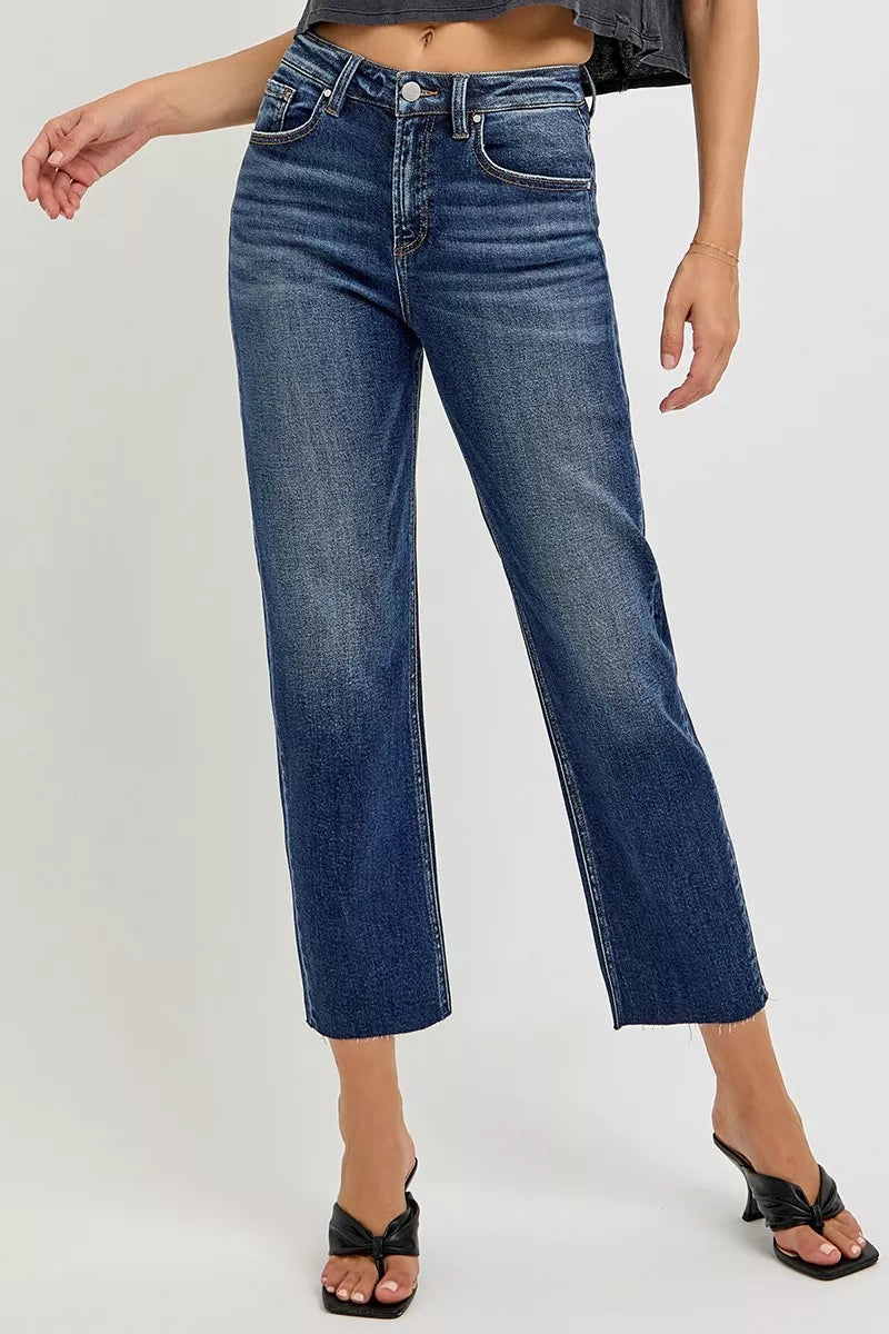 High rise slim barrel jeans with raw frayed hem