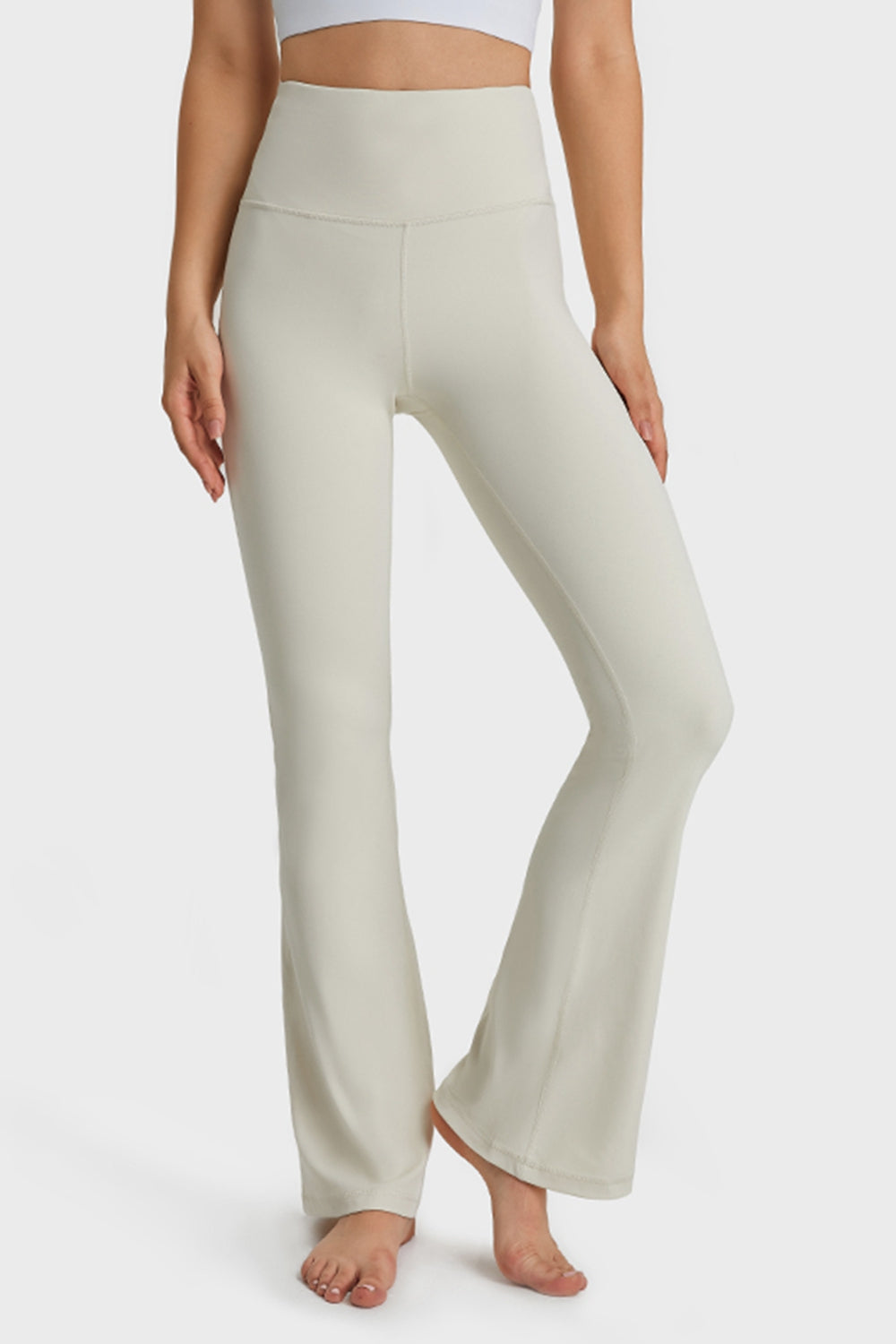 White High-rise flare yoga pants with wide elastic waistband