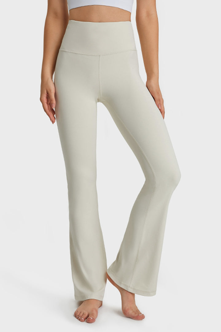 White High-rise flare yoga pants with wide elastic waistband