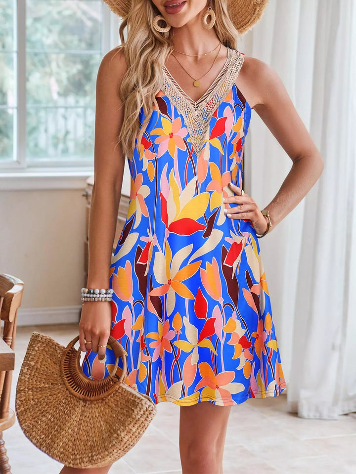 Tropical leaf print V-neck mini dress with crochet trim