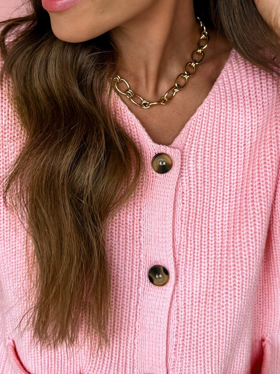 V-neck button-front knit sweater vest with patch pockets