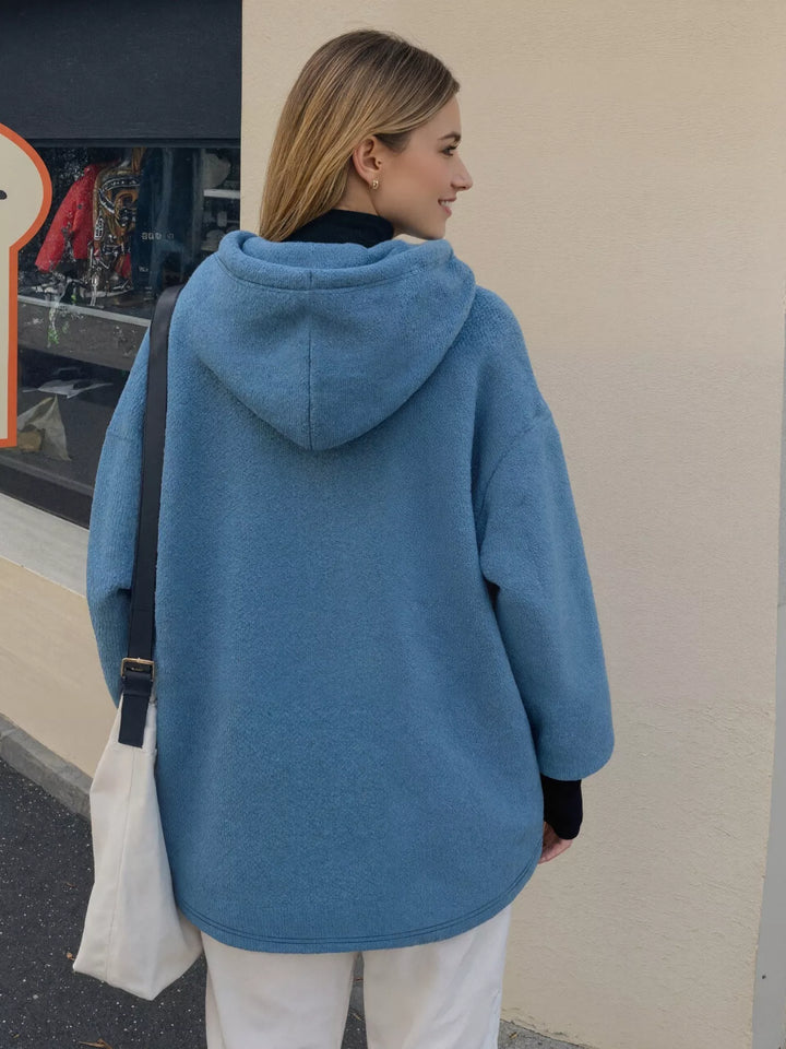 Oversized sherpa hoodie with kangaroo pocket and drawstring hood