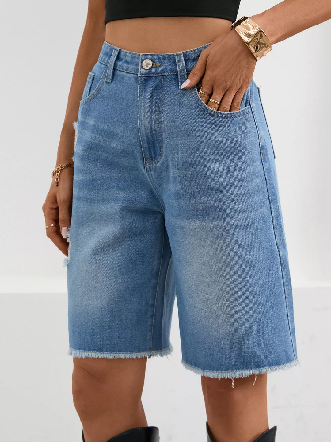 Distressed high-rise denim bermuda shorts with frayed hem