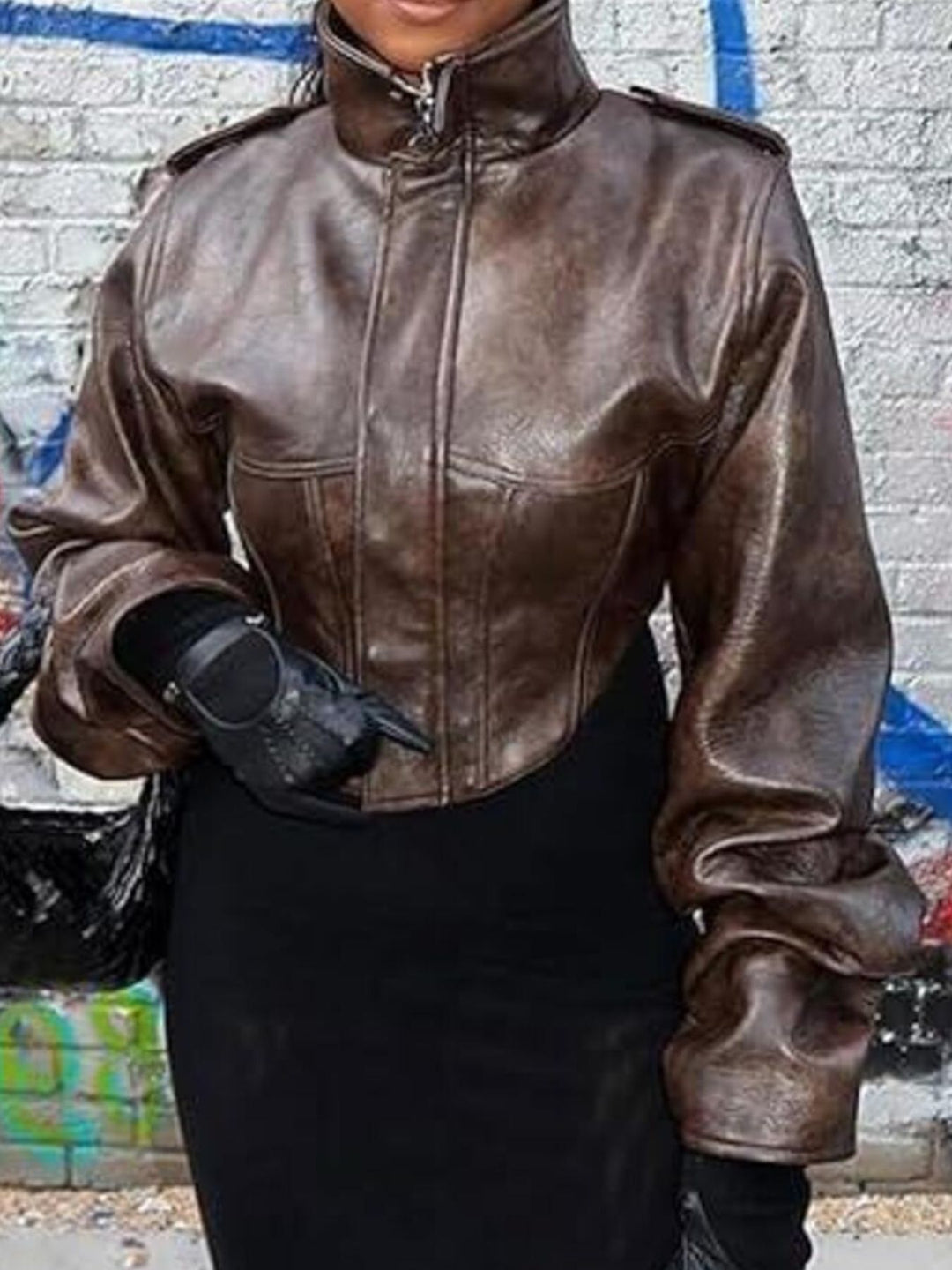 Distressed faux leather jacket with stand collar and corset seams