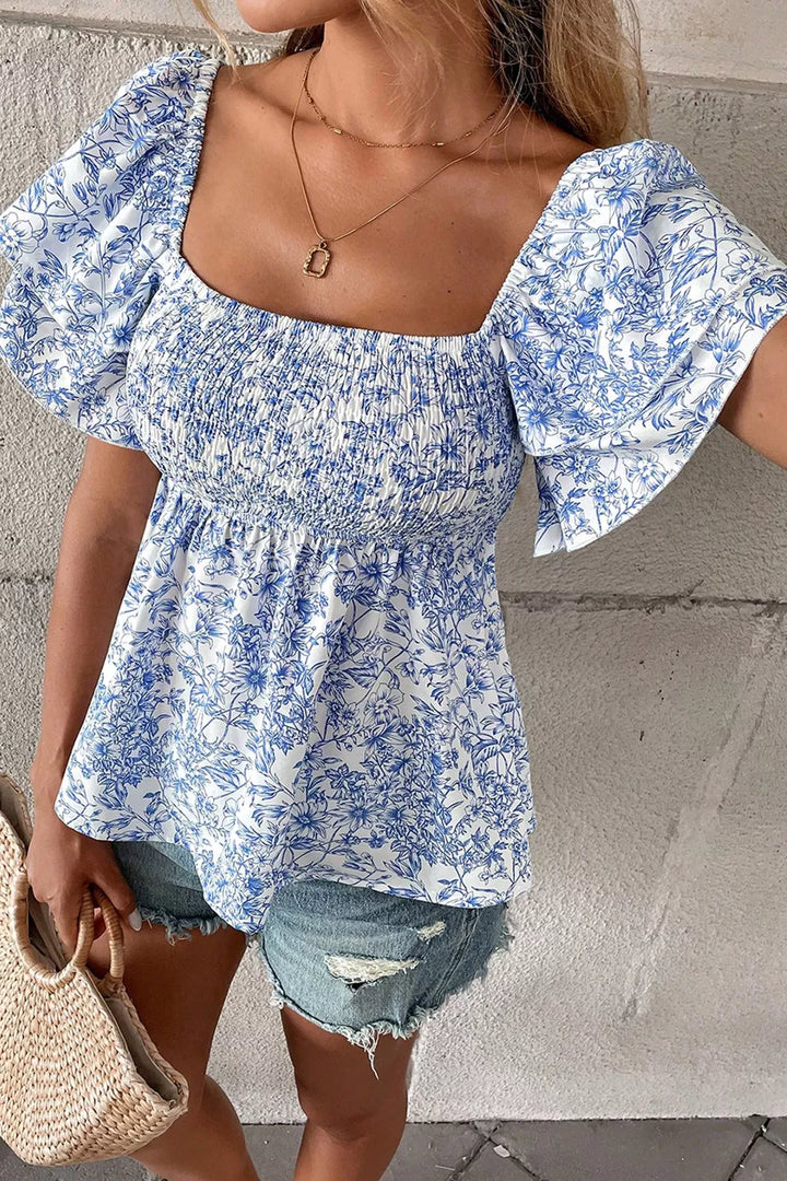 Floral square neck smocked babydoll blouse with ruffle sleeves