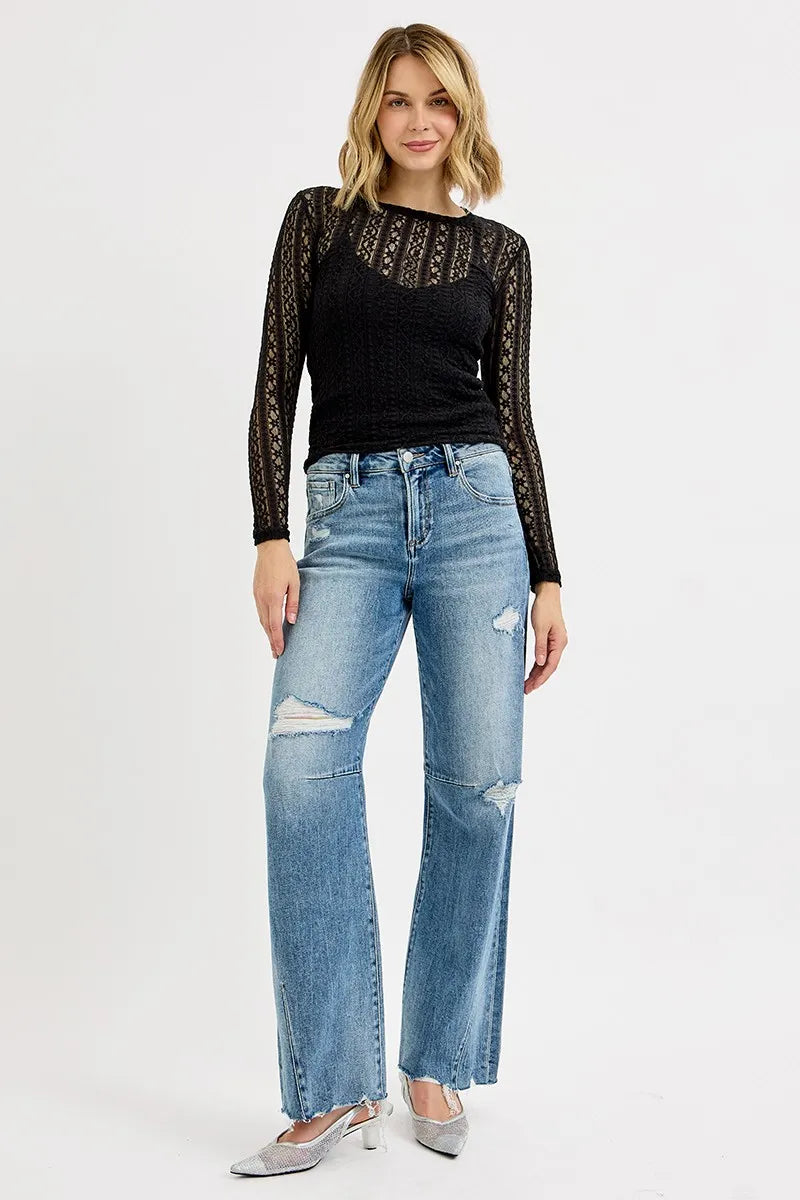 Distressed mid-rise wide-leg baggy jeans with raw hem