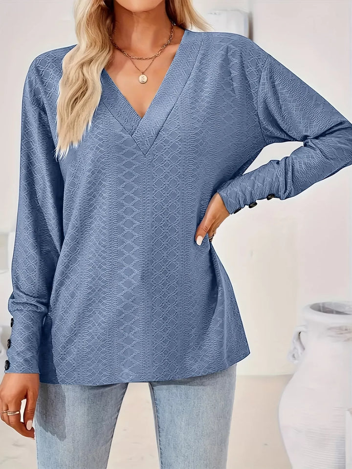 Plus size textured V-neck long sleeve top with button cuffs