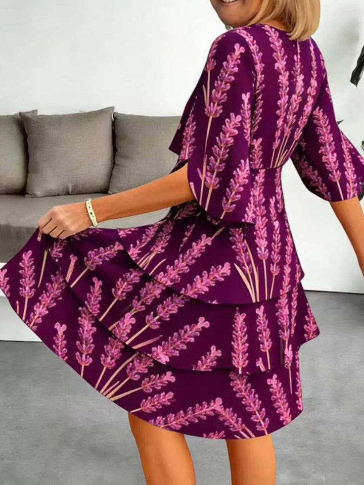 Tiered floral print midi dress with flutter sleeves