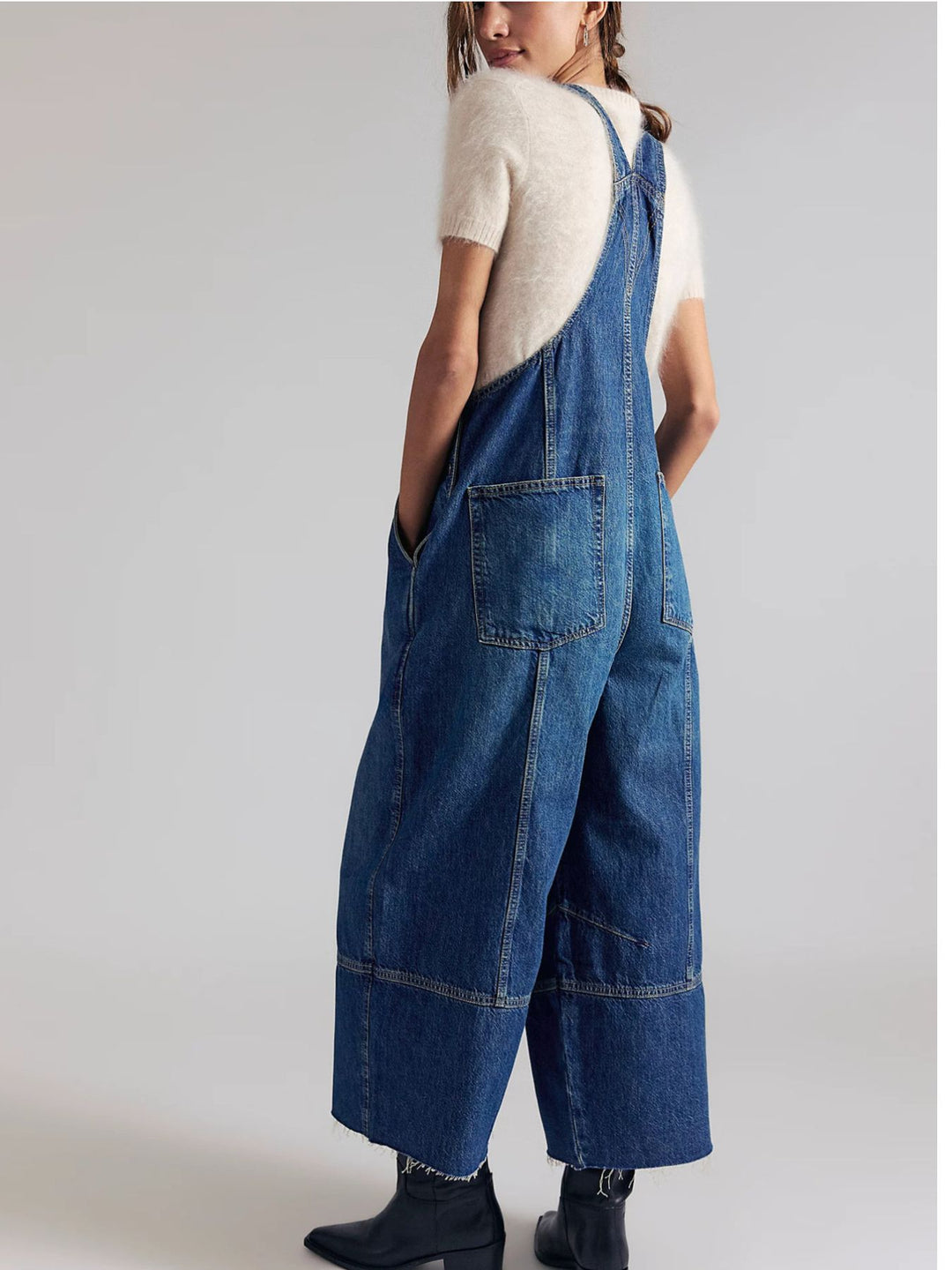 Pleated wide-leg denim overalls with raw hem