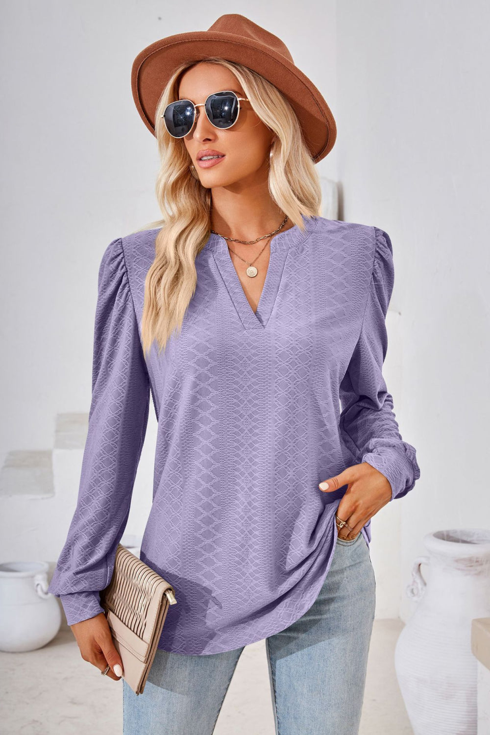 Textured knit split-neck puff sleeve blouse