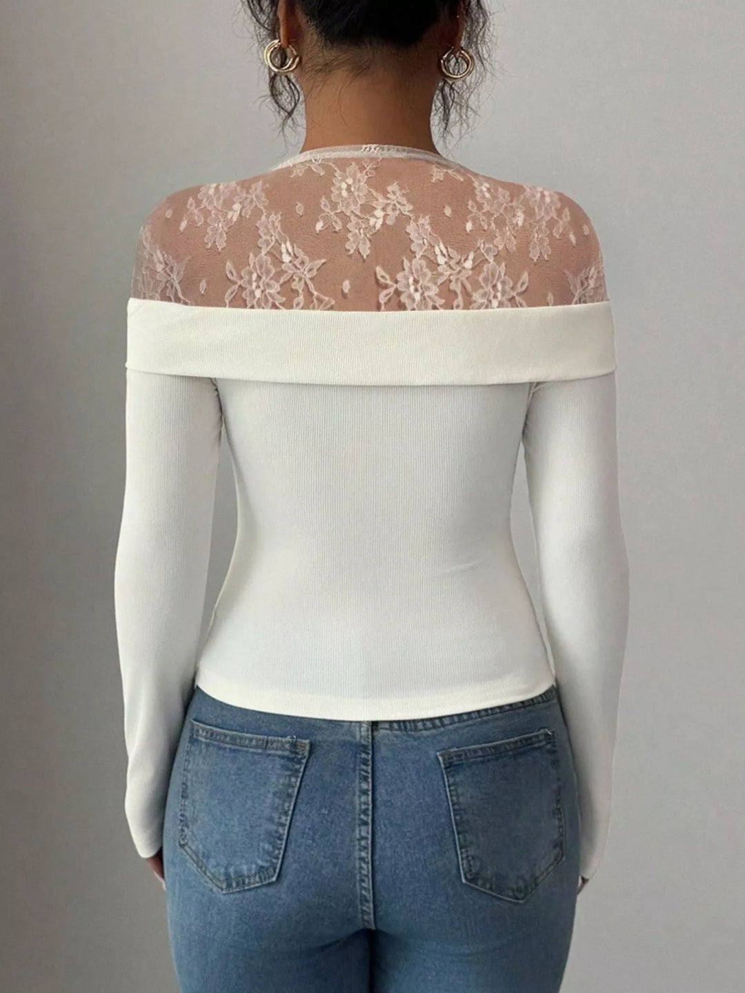 Sheer lace yoke long sleeve fitted top with flower trim