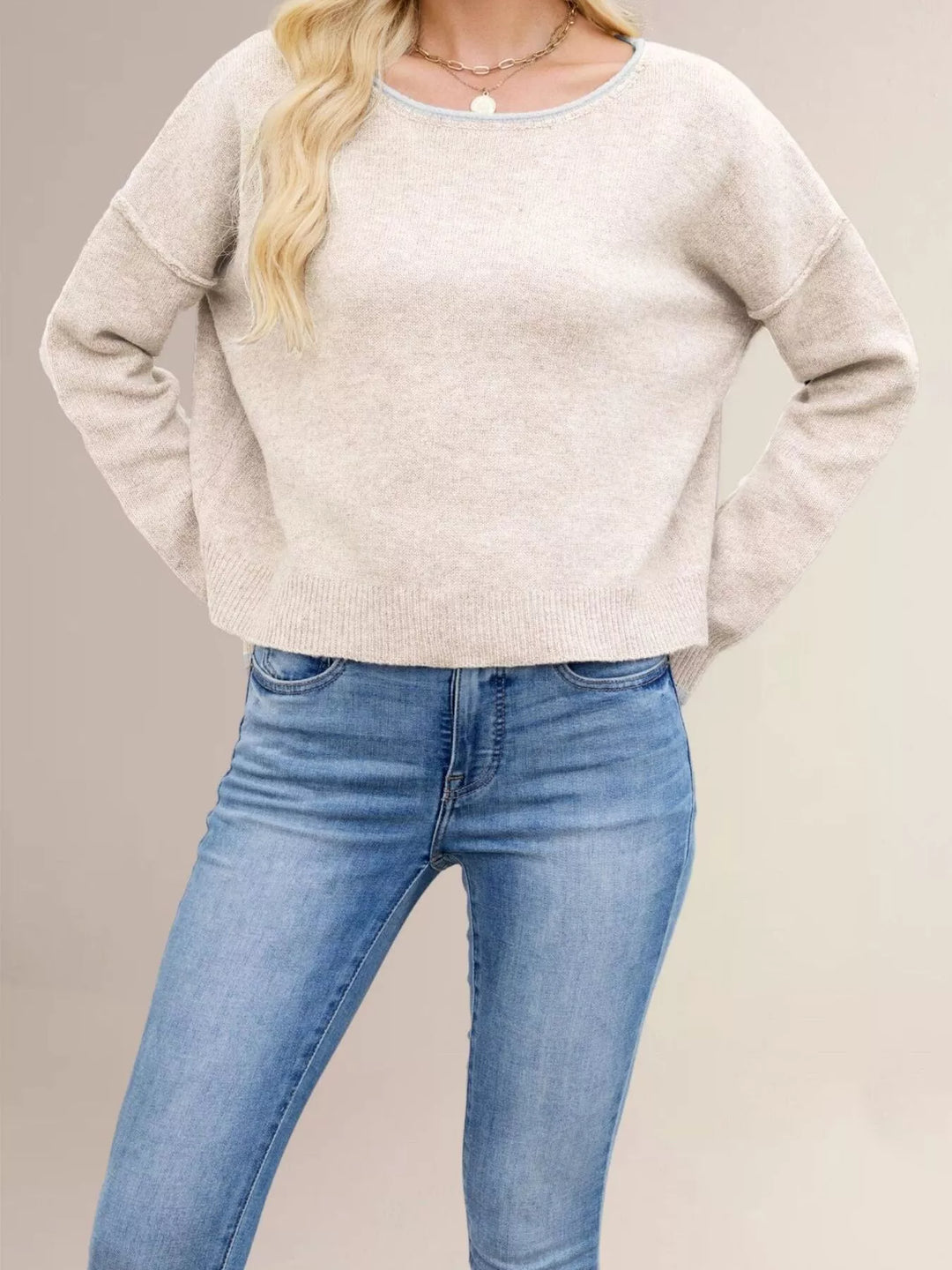 Contrast trim drop shoulder knit sweater with ribbed hem