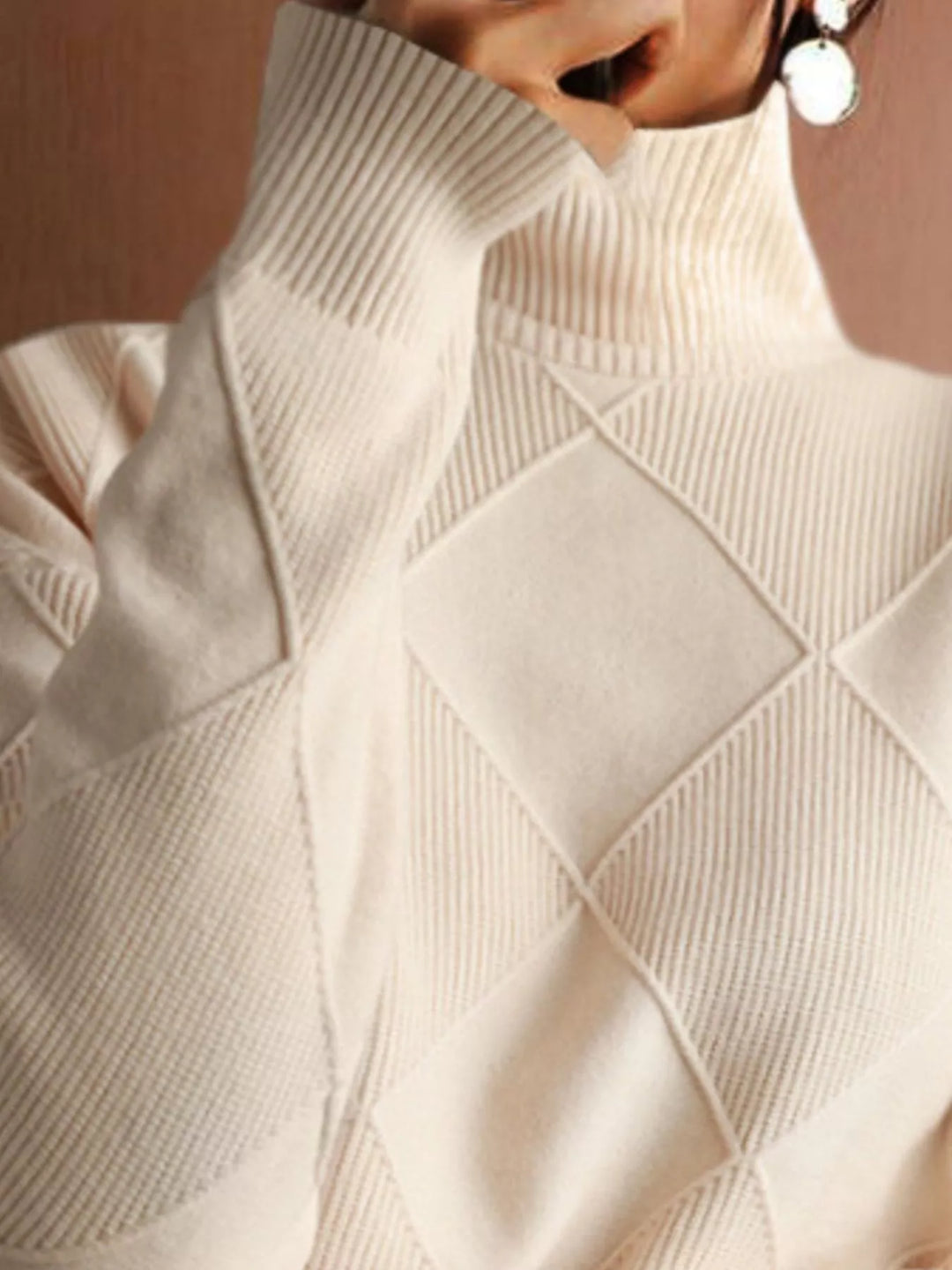 Textured argyle knit turtleneck sweater with ribbed cuffs