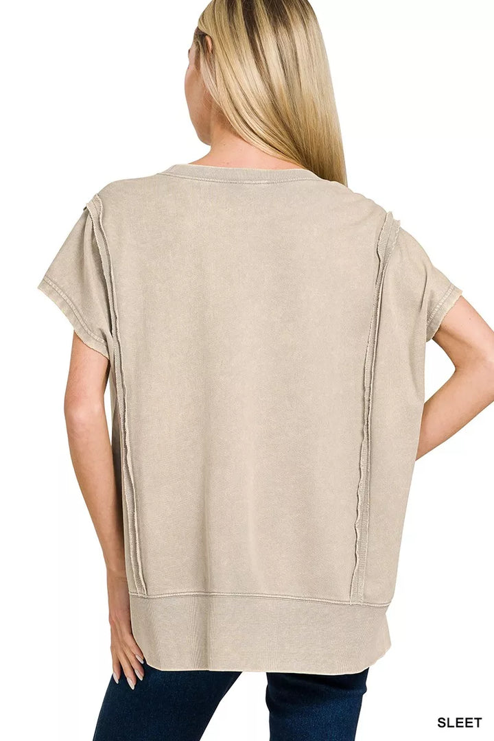 Acid-wash French terry top with exposed seams and hi-low hem