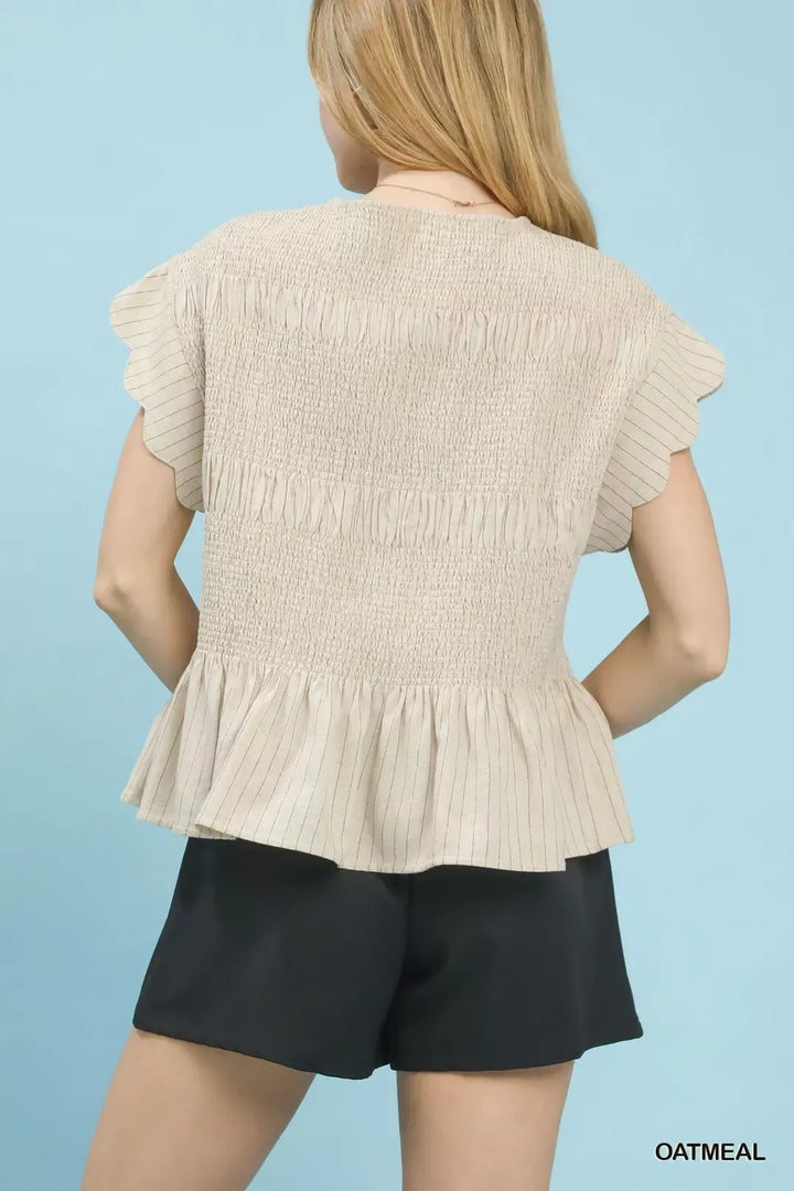 Pinstripe smocked peplum top with ruffle cap sleeves