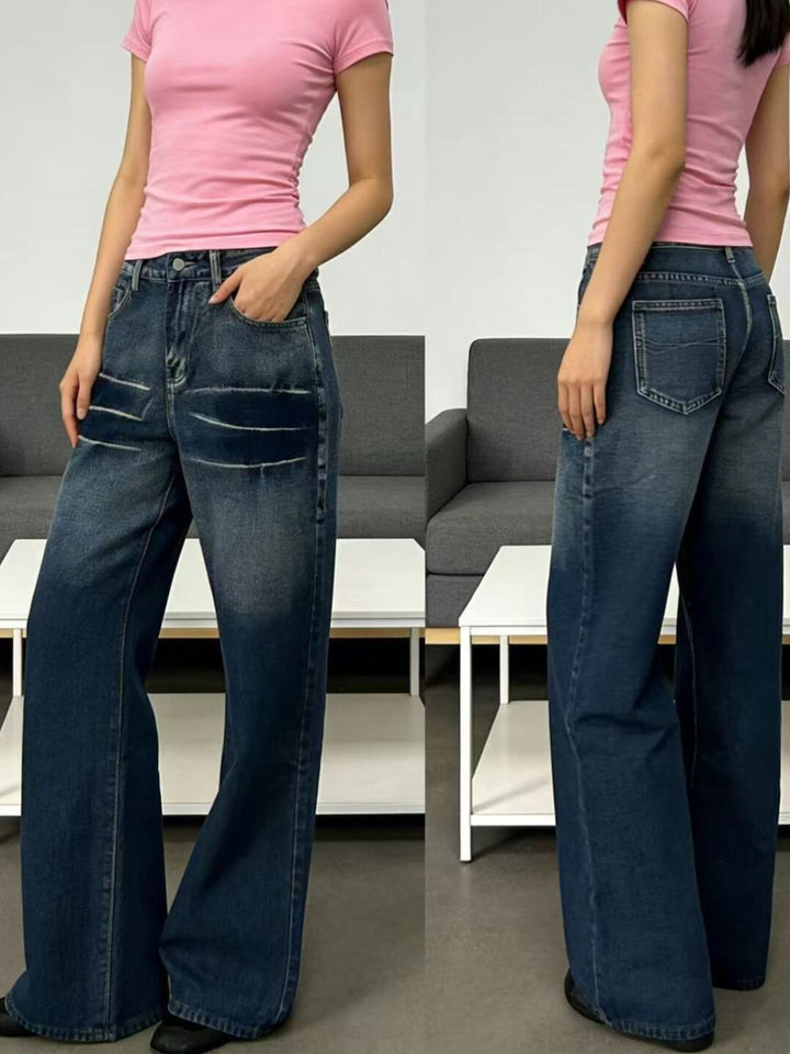 Distressed wide-leg jeans with faded thigh wash