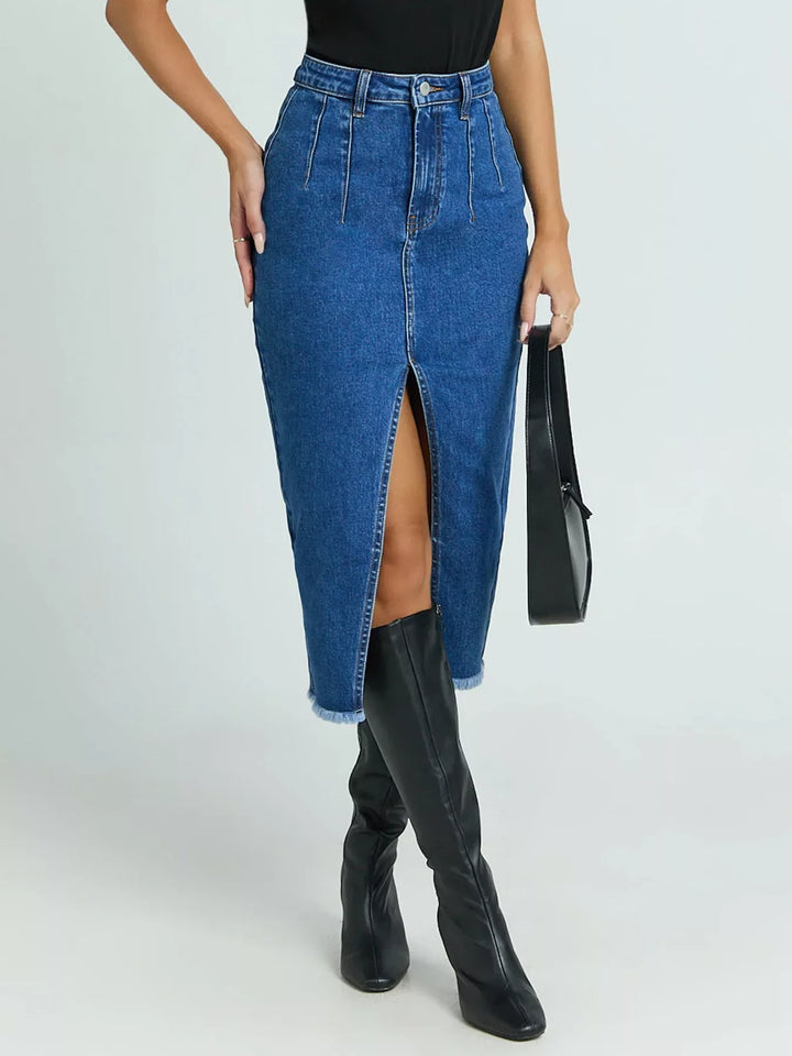 High-waist denim midi skirt with front slit and raw hem