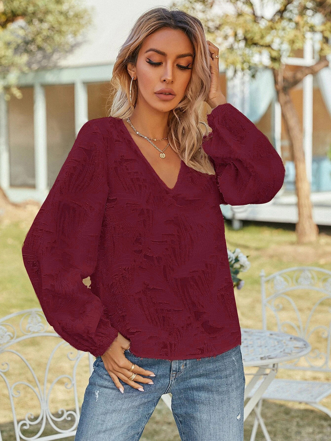 Textured v-neck blouse with balloon sleeves