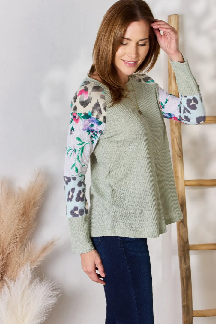 Waffle knit top with floral and leopard print sleeves
