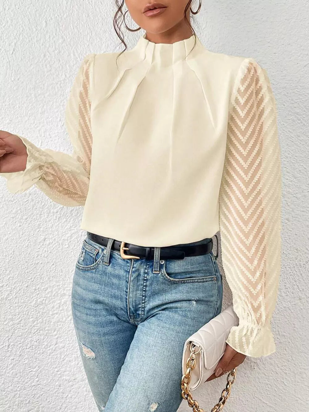 Cream Mock neck blouse with sheer textured flounce sleeves