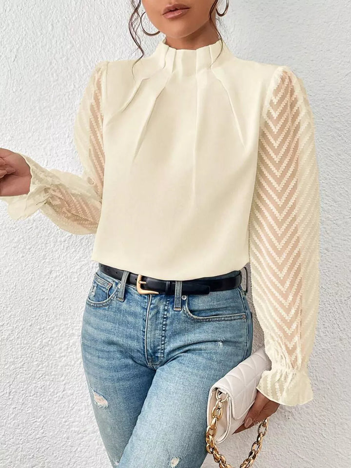 Cream Mock neck blouse with sheer textured flounce sleeves