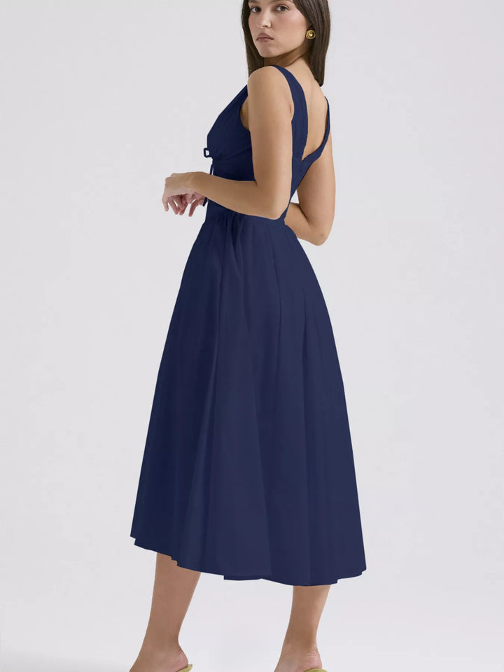 Sleeveless V-neck midi dress with fitted bodice and pockets