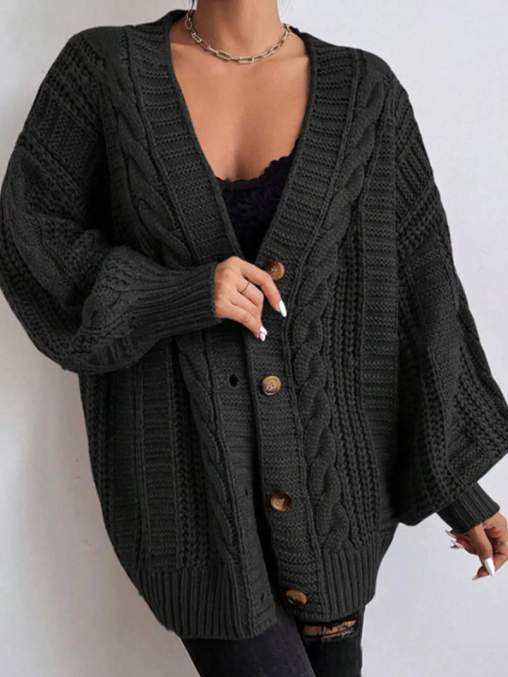 Oversized cable knit button-down cardigan with V-neck