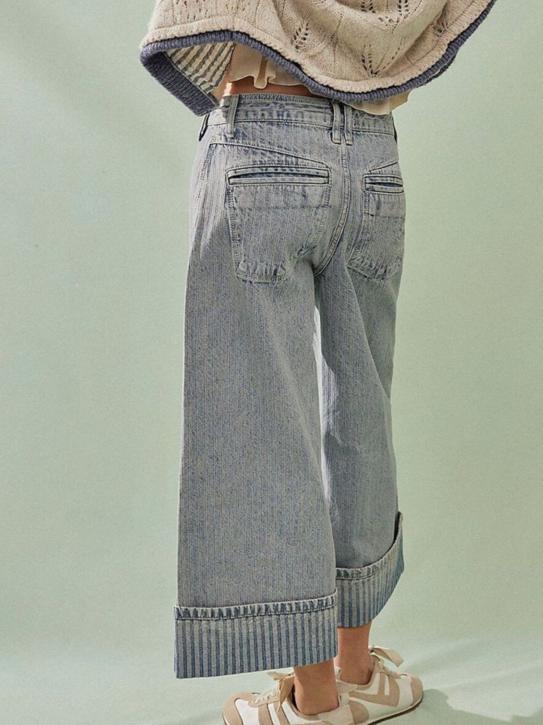 Wide-leg cropped jeans with deep cuffed hem and center seam