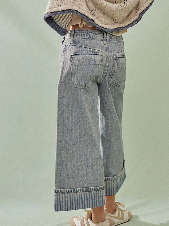 Wide-leg cropped jeans with deep cuffed hem and center seam