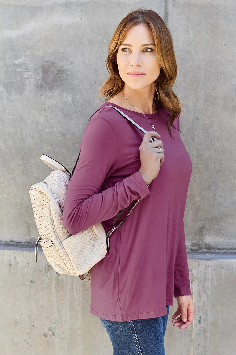 Crew neck long sleeve top with curved hem