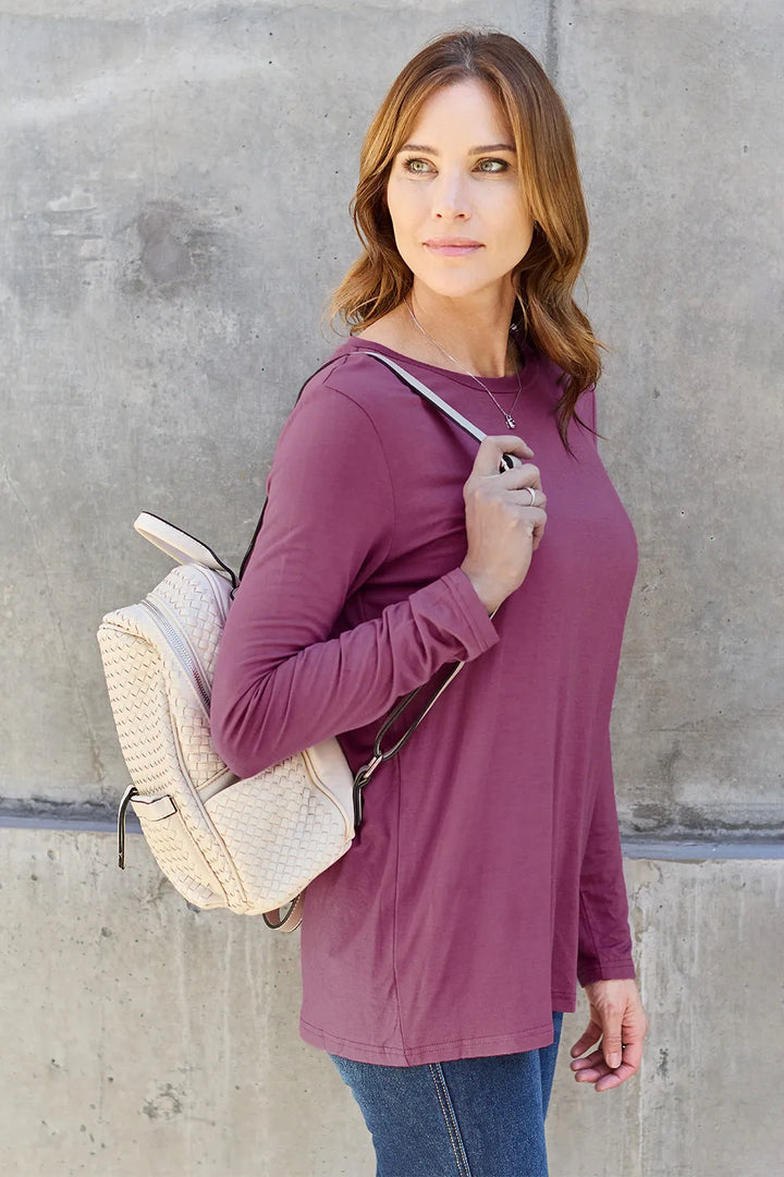 Crew neck long sleeve top with curved hem